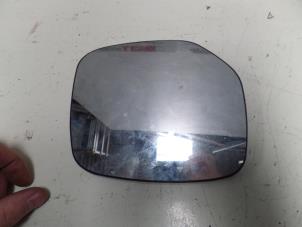Used Mirror glass, left Peugeot Partner 1.6 HDI 75 Price on request offered by N Kossen Autorecycling BV