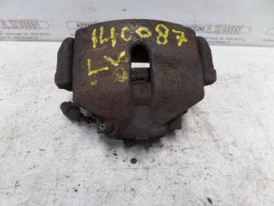 Used Front brake calliper, left Volkswagen Passat Price on request offered by N Kossen Autorecycling BV