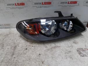 Used Headlight, right Nissan Almera Price on request offered by N Kossen Autorecycling BV
