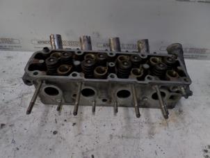 Used Cylinder head Opel Meriva 1.6 Price on request offered by N Kossen Autorecycling BV