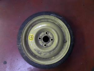 Used Space-saver spare wheel Daihatsu Cuore (L251/271/276) 1.0 12V DVVT Price on request offered by N Kossen Autorecycling BV