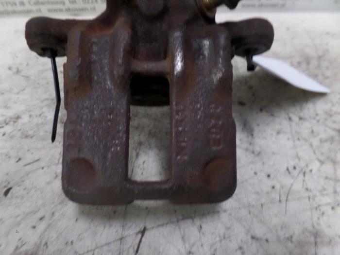 Rear brake calliper, left from a Nissan Almera Tino 2004