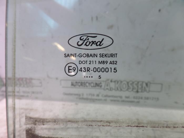 Vitre portière 4portes arrière gauche d'un Ford Focus 2 1.6 TDCi 16V 110 2005