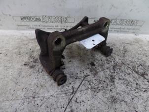 Used Rear brake calliperholder, right Volkswagen Transporter T5 1.9 TDi Price on request offered by N Kossen Autorecycling BV