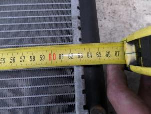 Radiator from a Volkswagen Golf III (1H1) 2.8 VR6 1992
