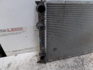 Radiator from a Volkswagen Golf III (1H1) 2.8 VR6 1992
