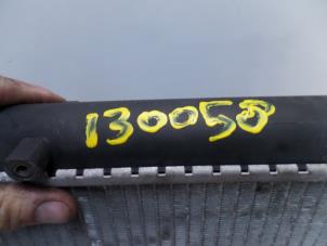 Radiator from a Volkswagen Golf III (1H1) 2.8 VR6 1992