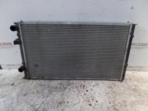 Radiator from a Volkswagen Golf III (1H1) 2.8 VR6 1992