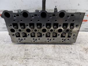 Used Cylinder head Chrysler Voyager Price on request offered by N Kossen Autorecycling BV