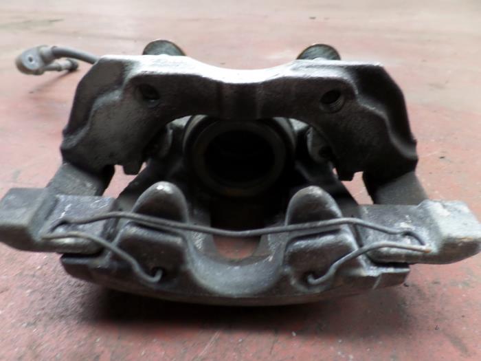 Front brake calliperholder, left from a Ford C-Max (DXA) 1.6 TDCi 16V Van 2014