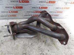Used Exhaust manifold Mitsubishi Colt (Z2/Z3) 1.5 16V Price on request offered by N Kossen Autorecycling BV