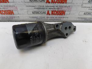 Used Oil filter housing Daihatsu Cuore (L251/271/276) 1.0 12V DVVT Price on request offered by N Kossen Autorecycling BV