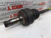 Drive shaft, rear left from a Mercedes-Benz C (W203) 2.0 C-180 16V 2001