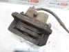 Front brake calliper, left from a Land Rover Discovery II 2.5 Td5 2004