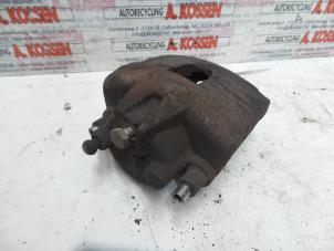 Used Front brake calliper, left Chrysler Voyager Price on request offered by N Kossen Autorecycling BV