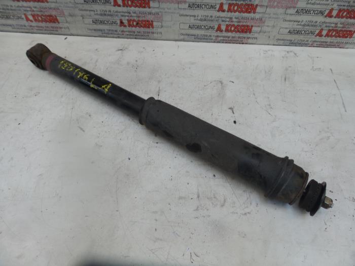 Rear shock absorber, left from a Mitsubishi Grandis (NA) 2.4 16V MIVEC 2004