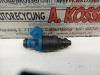 Injector (petrol injection) from a Volvo S40/V40 2001