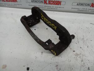 Used Front brake calliperholder, left Hyundai H-1/Starex Travel 2.5 TD Price on request offered by N Kossen Autorecycling BV