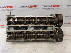 Used Cylinder head Ford Mondeo II 2.0i 16V Price on request offered by N Kossen Autorecycling BV