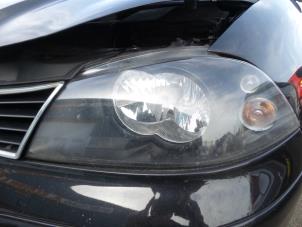 Używane Reflektor lewy Seat Ibiza III (6L1) 1.4 16V 75 Cena na żądanie oferowane przez N Kossen Autorecycling BV