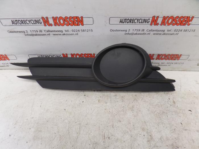 Fog light cover plate, right from a Opel Corsa 2009