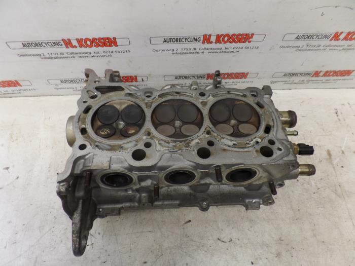 Cylinder head from a Mitsubishi Colt 2007