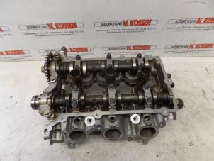 Used Cylinder head Mitsubishi Colt Price on request offered by N Kossen Autorecycling BV