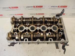 Used Cylinder head Opel Zafira Price on request offered by N Kossen Autorecycling BV