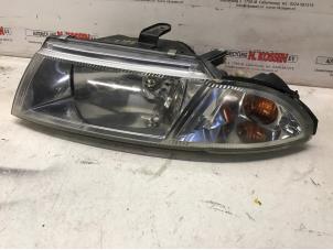 Used Headlight, left Mitsubishi Carisma 1.8 GDI 16V Price on request offered by N Kossen Autorecycling BV