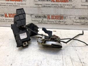 Used Door lock mechanism 2-door, left Hyundai Coupe 2.0i 16V Price on request offered by N Kossen Autorecycling BV