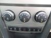 Panel de control de calefacción de un Dodge Avenger 2009