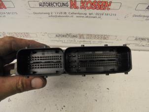 Engine management computer from a Dodge Avenger 2009