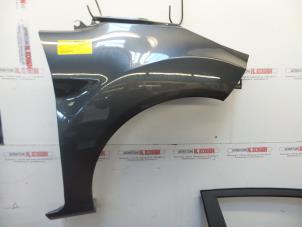 Used Front wing, right Ford Fiesta 6 (JA8) 1.0 Ti-VCT 12V 65 Price on request offered by N Kossen Autorecycling BV