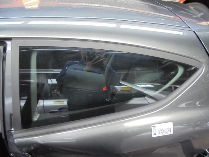 Window 2-door, rear left from a Ford Fiesta 6 (JA8) 1.0 Ti-VCT 12V 65 2015