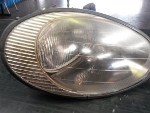 Used Headlight, right Ford Usa Taurus 3.0 V6 Price on request offered by N Kossen Autorecycling BV