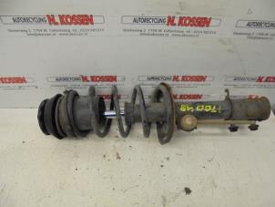 Used Front shock absorber rod, left Opel Corsa C (F08/68) 1.2 16V Price on request offered by N Kossen Autorecycling BV