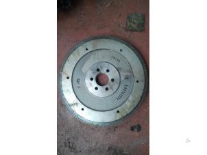 Usados Volante de inercia Opel Corsa D 1.4 16V Twinport Precio de solicitud ofrecido por N Kossen Autorecycling BV