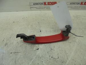 Used Front door handle 4-door, right Opel Tigra Price on request offered by N Kossen Autorecycling BV