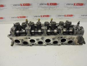 Used Cylinder head Hyundai H-1/Starex Travel 2.5 TD Price on request offered by N Kossen Autorecycling BV
