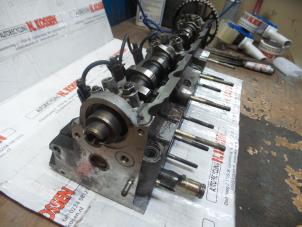 Used Cylinder head Peugeot Partner 1.8 D Price on request offered by N Kossen Autorecycling BV