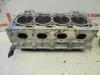 Cylinder head from a Volkswagen Lupo (6X1) 1.4 16V 75 1999