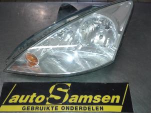 Used Headlight, left Ford Focus 1 1.6 16V Price € 40,00 Margin scheme offered by Auto Samsen B.V.
