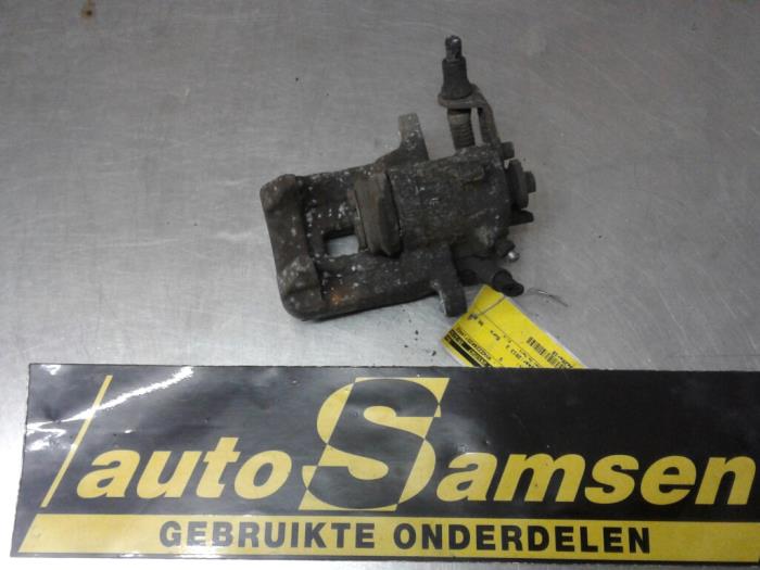 Rear brake calliper, left from a Volkswagen Polo V (6R) 1.2 TSI 2013
