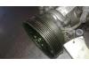 Air conditioning pump from a Renault Twingo II (CN) 1.5 dCi 90 FAP 2011