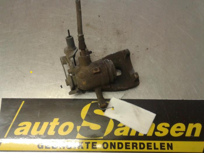 Rear brake calliper, left from a Ford Mondeo IV Wagon 2.0 TDCi 130 16V 2007
