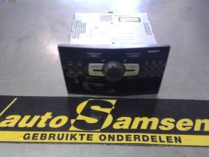 Usagé Radio/Lecteur CD Opel Corsa D 1.2 16V Prix € 100,00 Règlement à la marge proposé par Auto Samsen B.V.