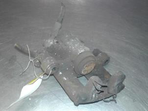 Used Rear brake calliper, left BMW Mini One/Cooper (R50) 1.6 16V Cooper Price € 50,00 Margin scheme offered by Auto Samsen B.V.