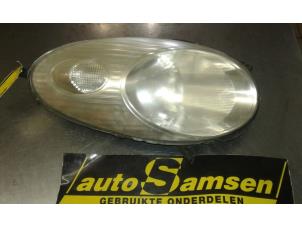 Used Headlight, left Nissan Micra (K12) 1.2 16V Price € 40,00 Margin scheme offered by Auto Samsen B.V.
