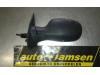 Wing mirror, left from a Nissan Micra (K12) 1.2 16V 2003