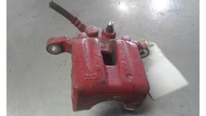 Rear brake calliper, left from a Kia Sportage (SL) 2.0 CVVT 16V 4x2 2012